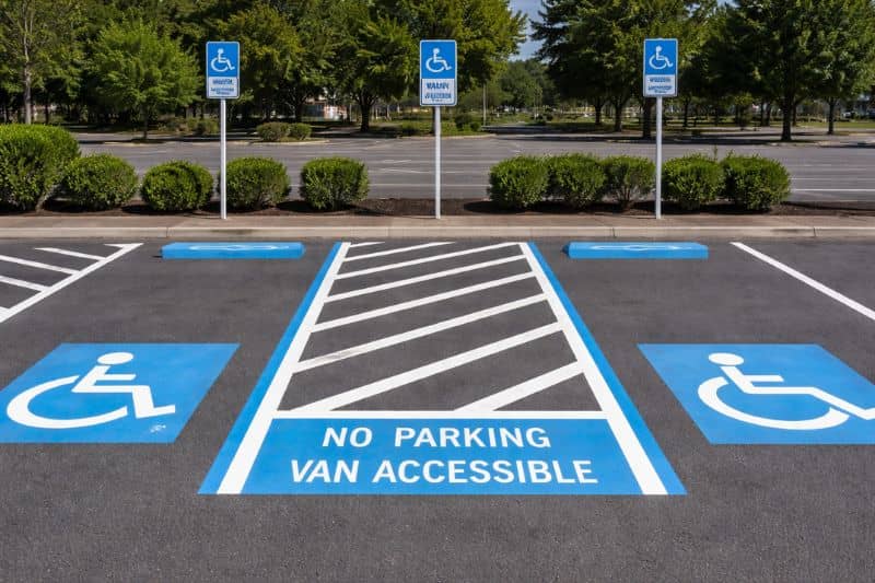 ADA compliant parking spaces with access aisles and van accessible markings